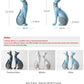 White and Blue Cat Figurines