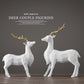 A pair of white Deer figurine